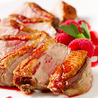 Cuisses de canard au miel et framboises