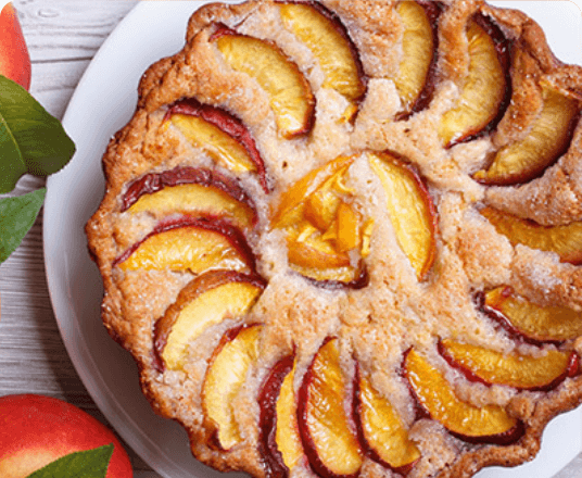 Tarte sablée aux pêches et aux amandes