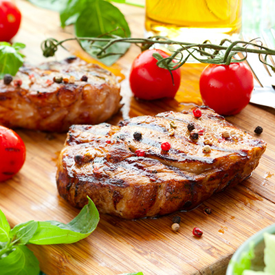 Quebec grain-fed veal rib eye steak, with pearl onions and raisins