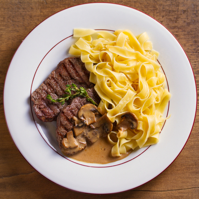 Grain-Fed Veal Tenderloin à la Rossini, with Fresh Tagliatelle and morel mushroom sauce, from Montreal's Europa Restaurant