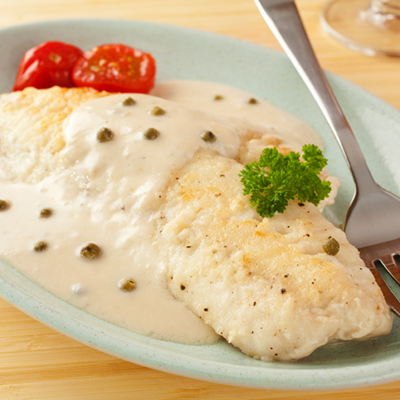 Filets de poisson blanc grillés, sauce au poivre vert