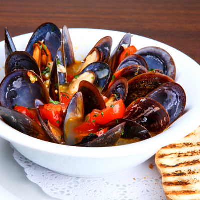 Moules au fromage bleu et aux tomates séchées