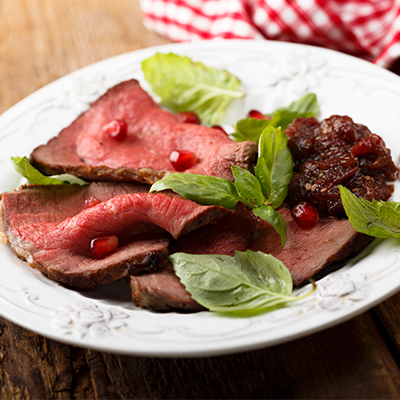 Spice-coated top sirloin roast served on eggplant caviar