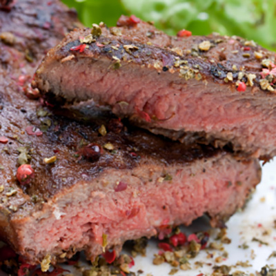 Beef Sirloin Steaks with Dried Tomato and Oregano