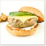 Veal Burger with Grilled Red Pepper, Sun-dried Tomato Dressing and Old Cheddar