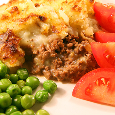 Étagé de pommes de terre et boeuf haché avec duxelles de portobello