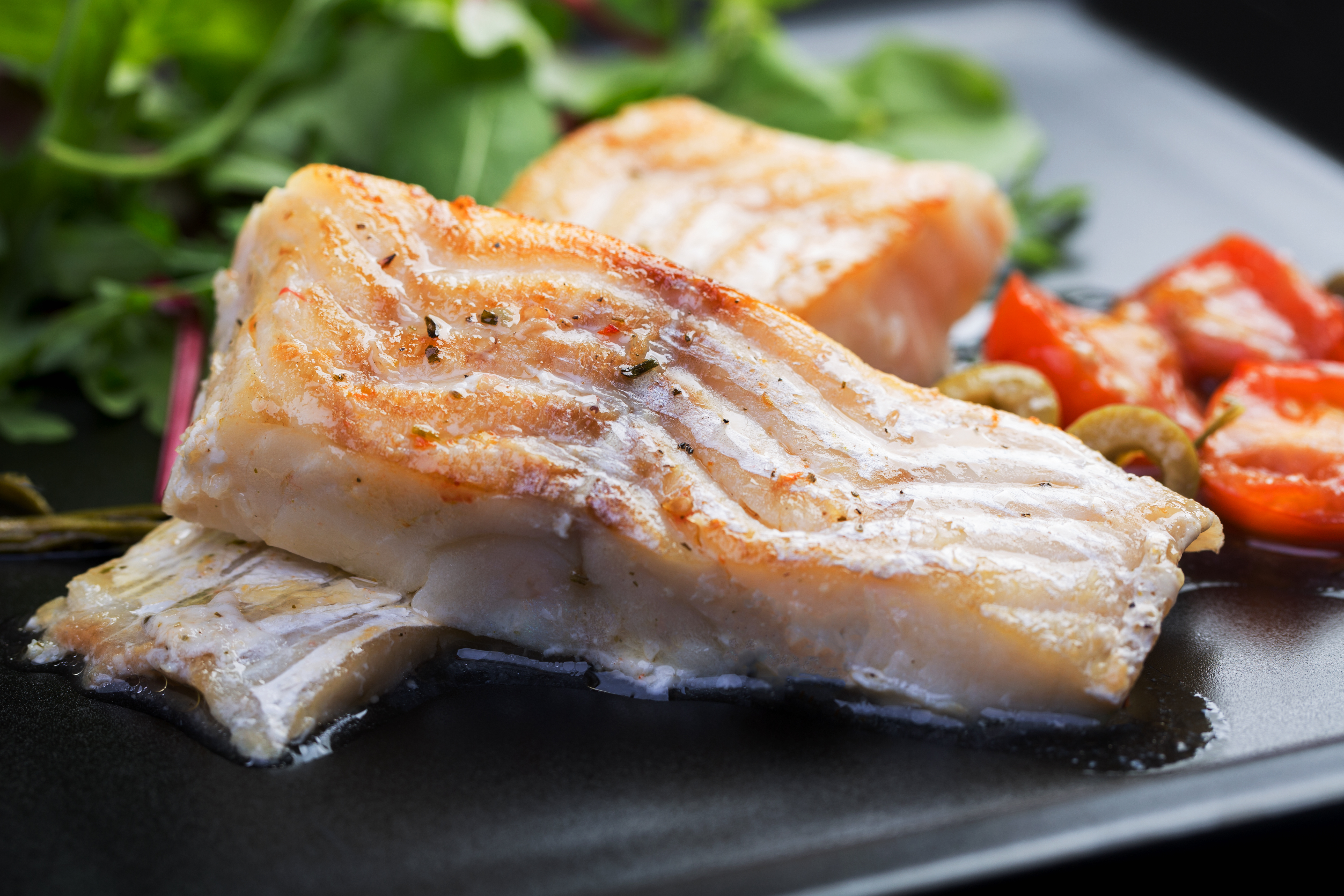 Filets de doré sur lit de tomates et de fenouil