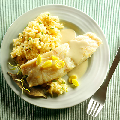 Filets de poisson blanc au four sur risotto 