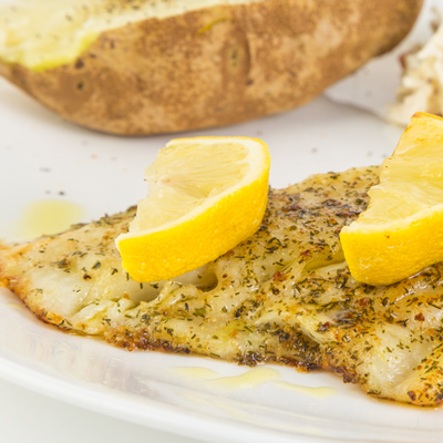 Filets de turbot aux fines herbes et  agrumes en papillote