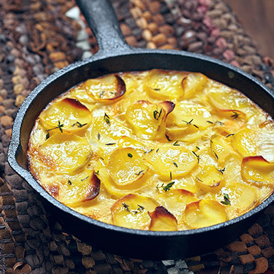 Gratin de pommes de terre aux épinards et jambon fumé