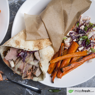 Pork Gyros with Harissa Yogurt, Feta, and Carrot Fries