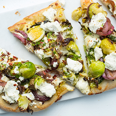 Brussels Sprout and Caramelized Onion Pizzas with Parmesan, Mozzarella and Goat Cheese