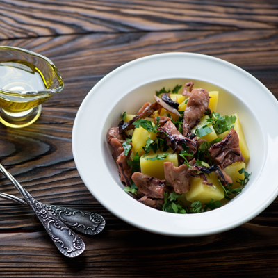 Salade tiède de pieuvre grillée et pommes de terre