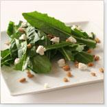 Dandelion salad and mustard greens with parmesan