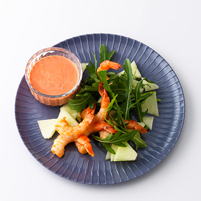 Salade de roquette, de crevettes grillées et melon