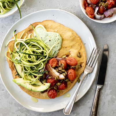 Socca with zucchini and balsamic tomato salad