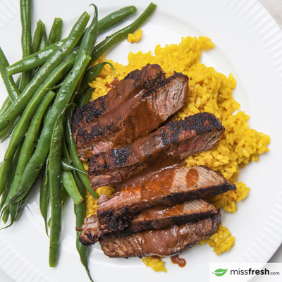 Chipotle Steaks with Turmeric Rice and Green Beans