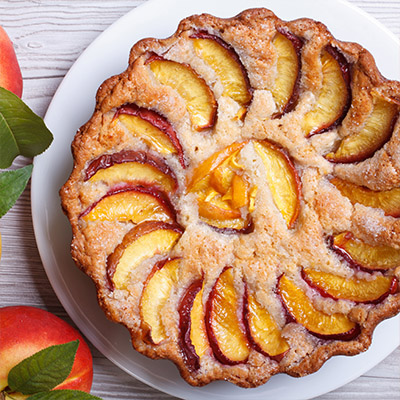 Tarte sablée aux pêches et aux amandes